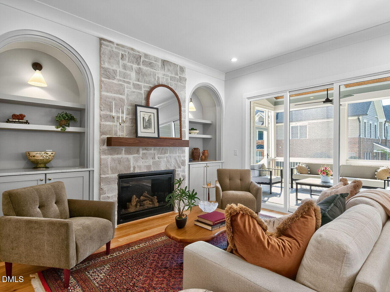 208 East Whitaker Mill Road Raleigh, NC 27608 - Photo 8 of 52 a living room with furniture and a fireplace