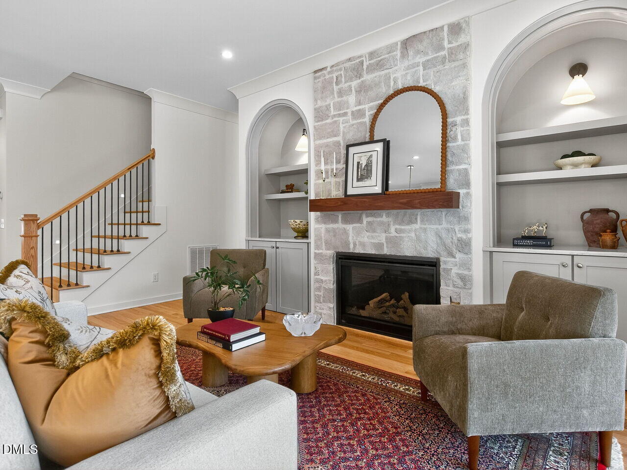 208 East Whitaker Mill Road Raleigh, NC 27608 - Photo 10 of 52 a living room with furniture and a fireplace
