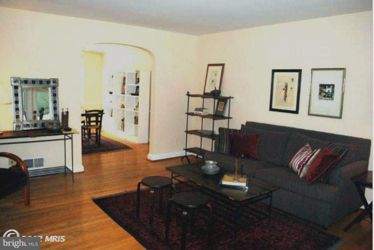 310 Stanmore Road Baltimore, MD 21212 - Photo 22 of 24 a living room with furniture window and wooden floor