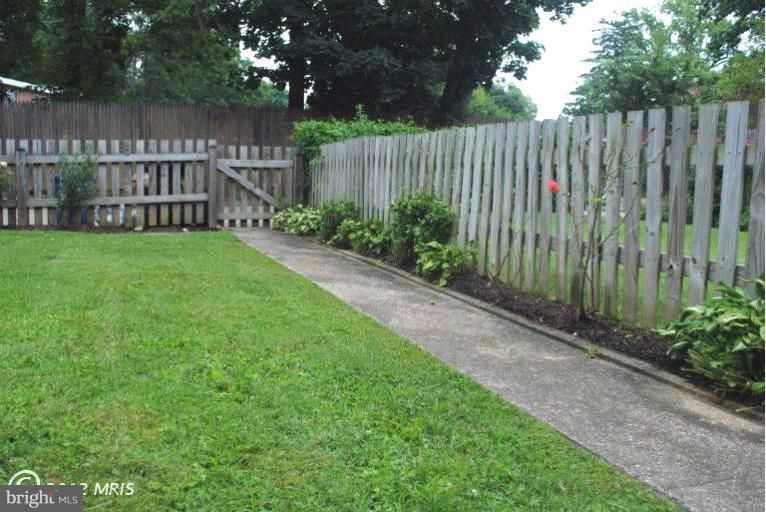 310 Stanmore Road Baltimore, MD 21212 - Photo 8 of 24 a view of a backyard with a garden