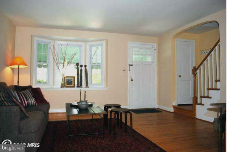 310 Stanmore Road Baltimore, MD 21212 - Photo 9 of 24 a living room with furniture and wooden floor