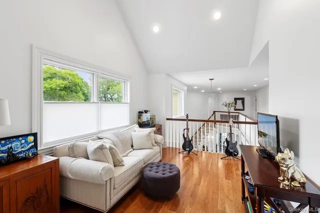 a living room with furniture and a table