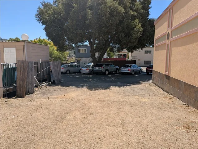 a view of a street with cars