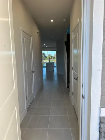 a bathroom with a sink double vanity granite and a mirror