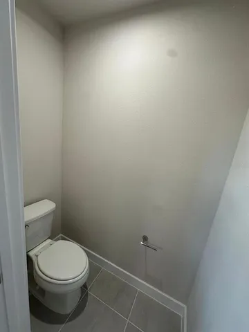 a view of a garden with an ocean