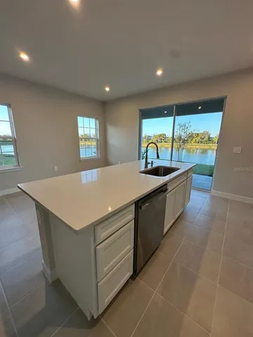 a view of a yard and front view of a house