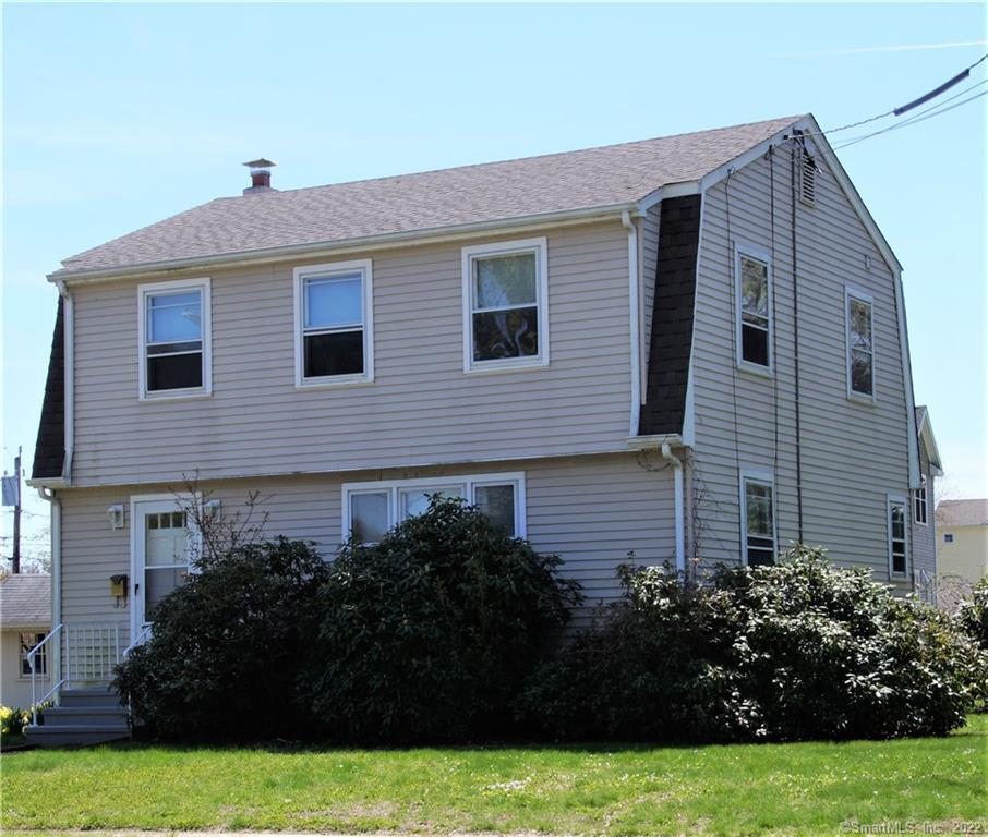 523 Main Street Old Saybrook, CT 06475 - Photo 1 of 1 a view of a house with garden and plants