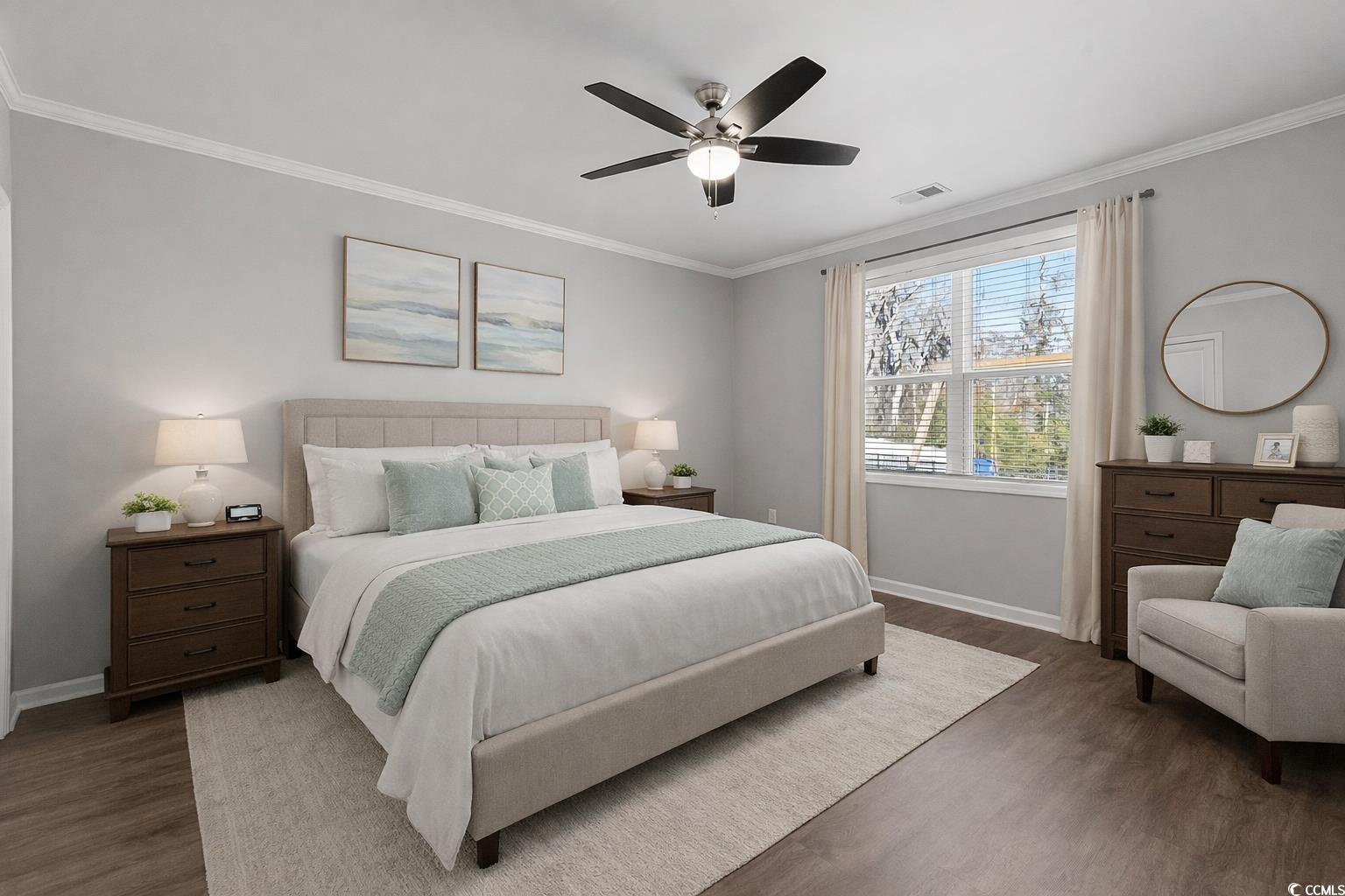 292 Carmello Circle Conway, SC 29526 - Photo 18 of 33 Unfurnished bedroom featuring ornamental molding, dark wood-type flooring, a ceiling fan, and ensuite bath