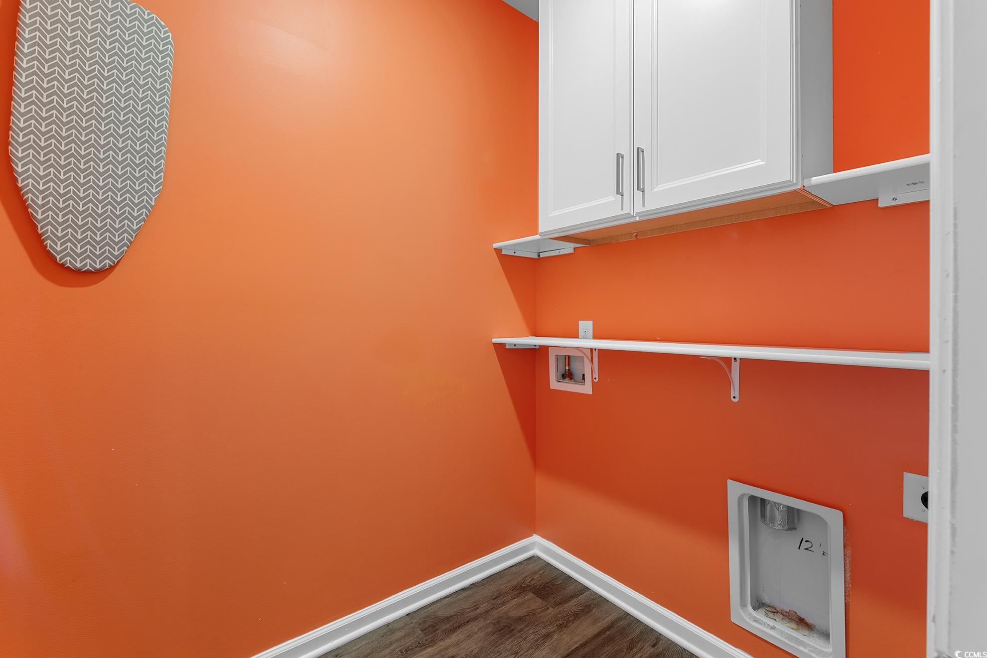 292 Carmello Circle Conway, SC 29526 - Photo 22 of 33 Laundry area featuring cabinet space, hookup for a washing machine, and dark wood-style floors