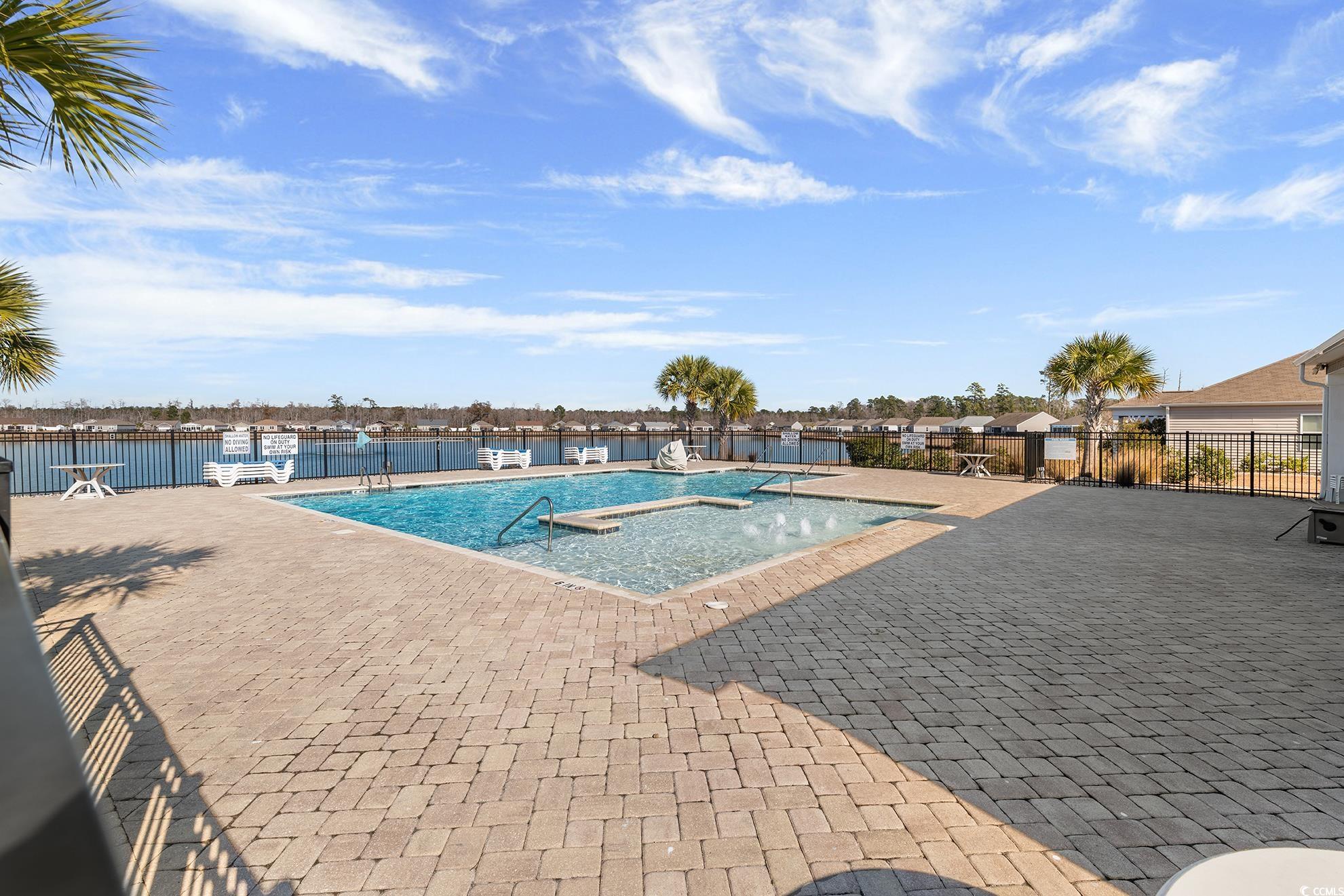 292 Carmello Circle Conway, SC 29526 - Photo 30 of 33 Community pool featuring a patio and a jacuzzi