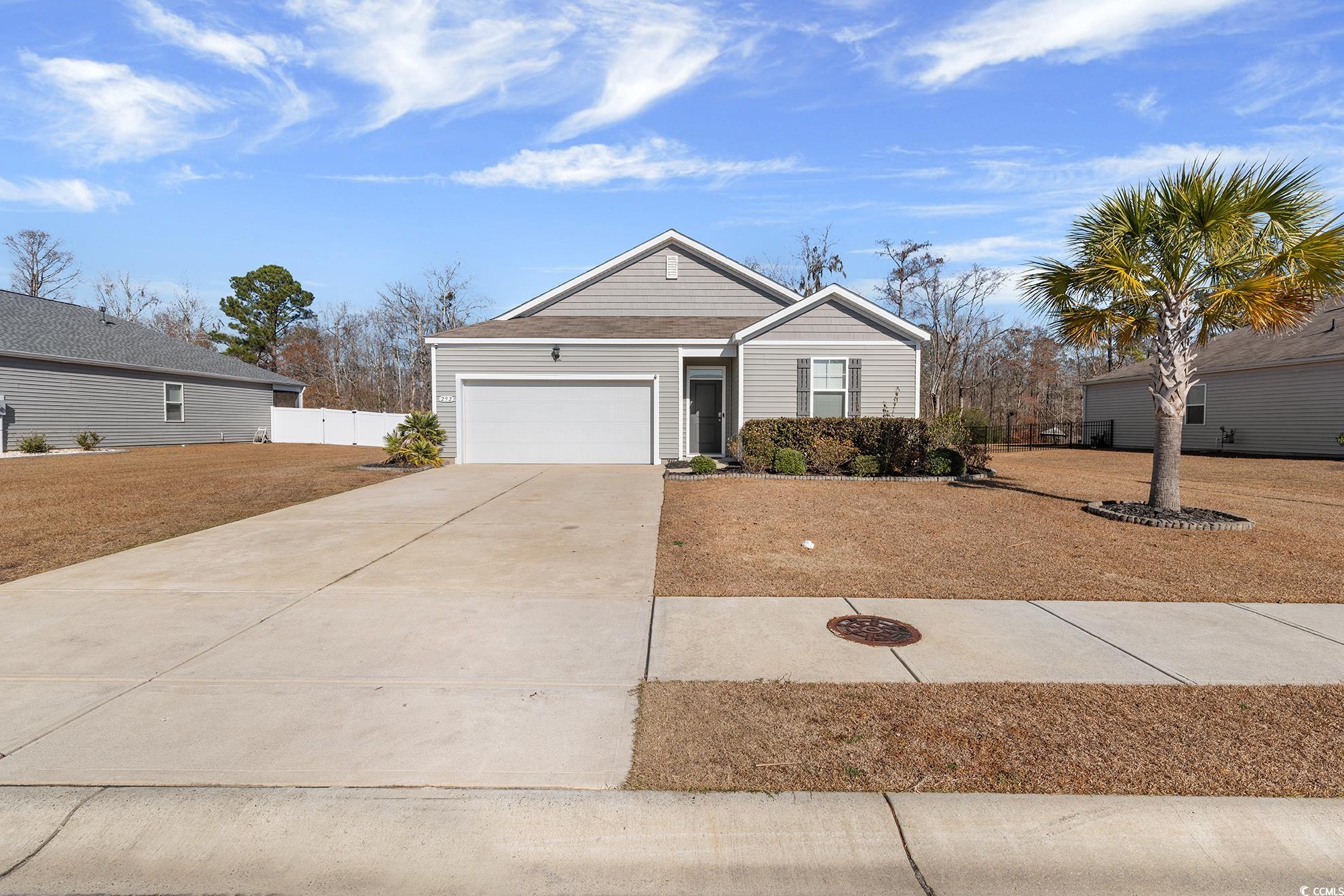 292 Carmello Circle Conway, SC 29526 - Photo 4 of 33 View of front of house with driveway and an attached garage