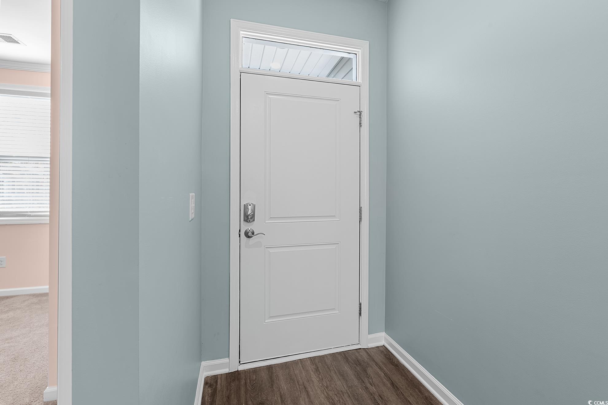 292 Carmello Circle Conway, SC 29526 - Photo 6 of 33 Entryway with baseboards and wood finished floors