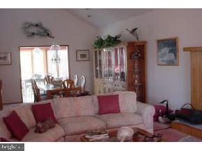 114 Clifton Road Barnegat, NJ 08005 - Photo 5 of 6 a living room with furniture and a large window