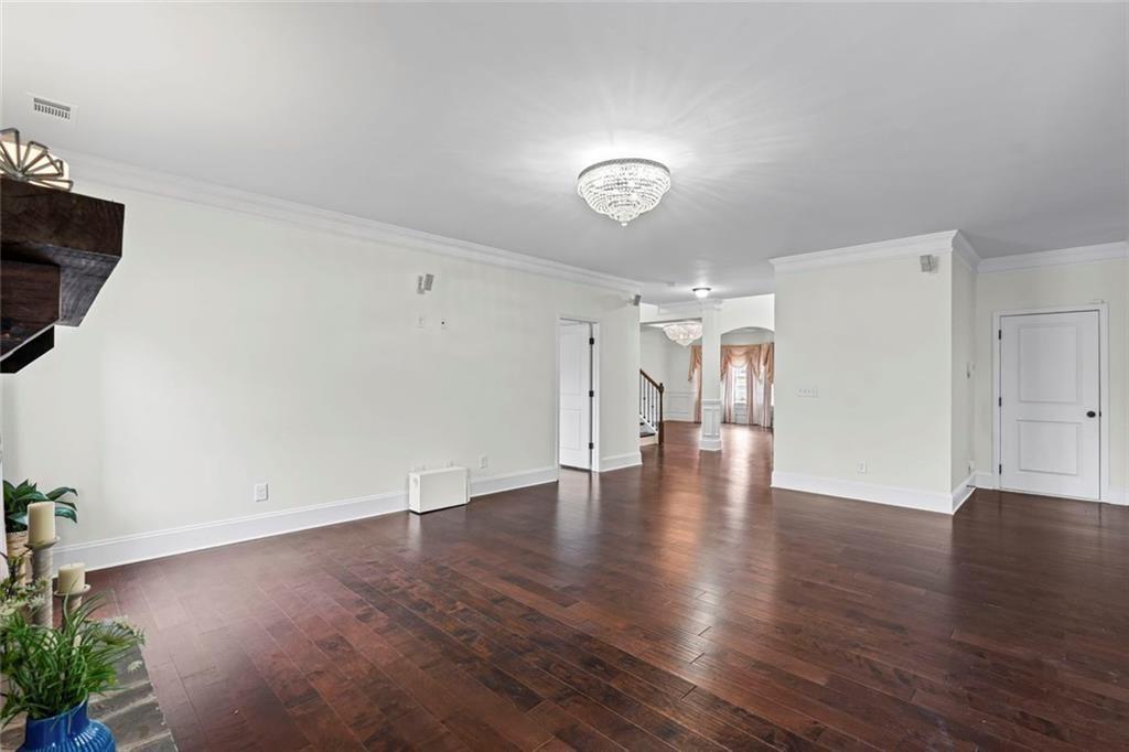 3915 Estates Path Cumming, GA 30040 - Photo 12 of 50 a view of a livingroom with wooden floor