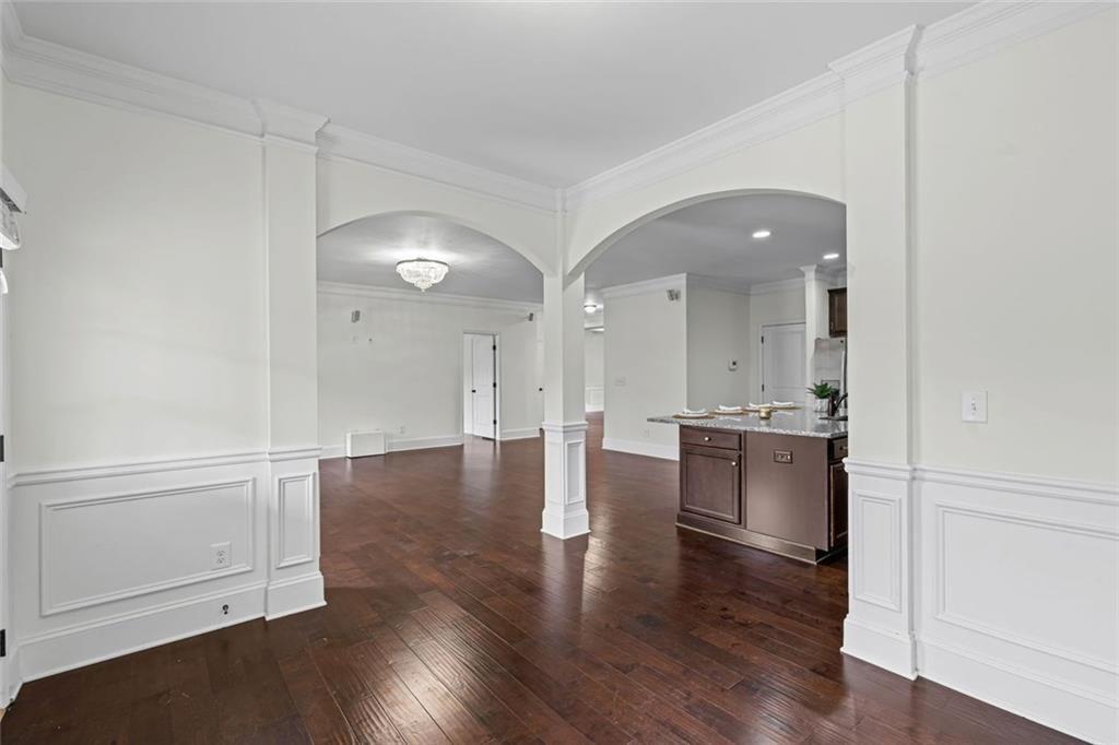 3915 Estates Path Cumming, GA 30040 - Photo 23 of 50 a view of a kitchen with wooden floor and a sink