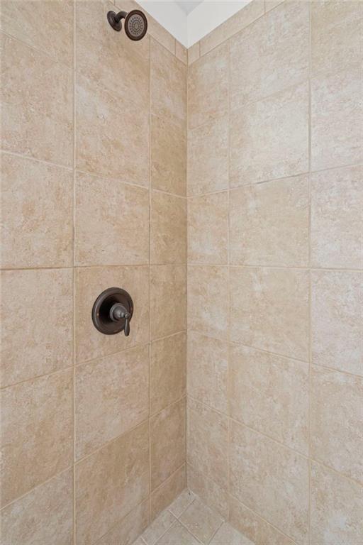 3915 Estates Path Cumming, GA 30040 - Photo 35 of 50 a bathroom with a shower