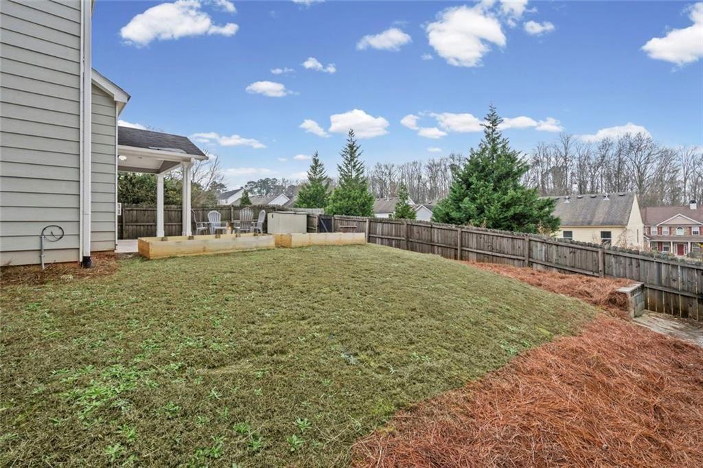 3915 Estates Path Cumming, GA 30040 - Photo 49 of 50 a view of a backyard