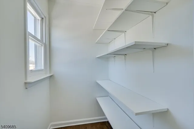 a view of small space with racks on the wall