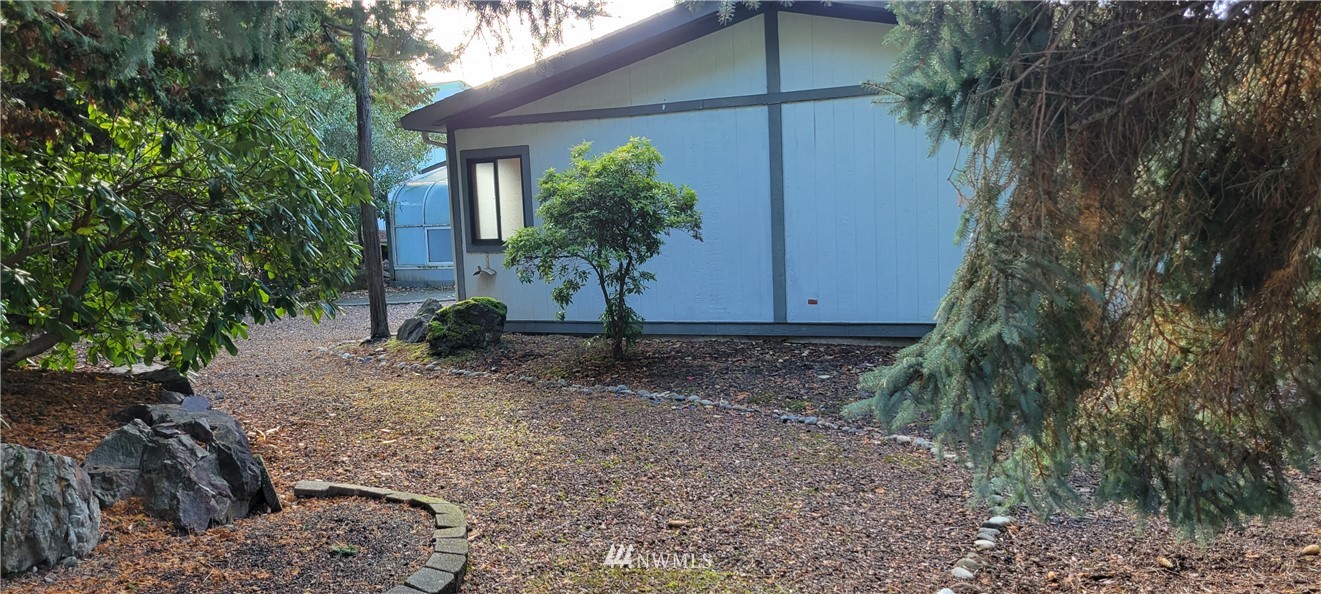 729 236th Place Southwest Bothell, WA 98021 - Photo 16 of 40 a view of a house with a yard