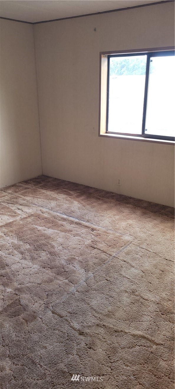 729 236th Place Southwest Bothell, WA 98021 - Photo 23 of 40 a view of an empty room with a window