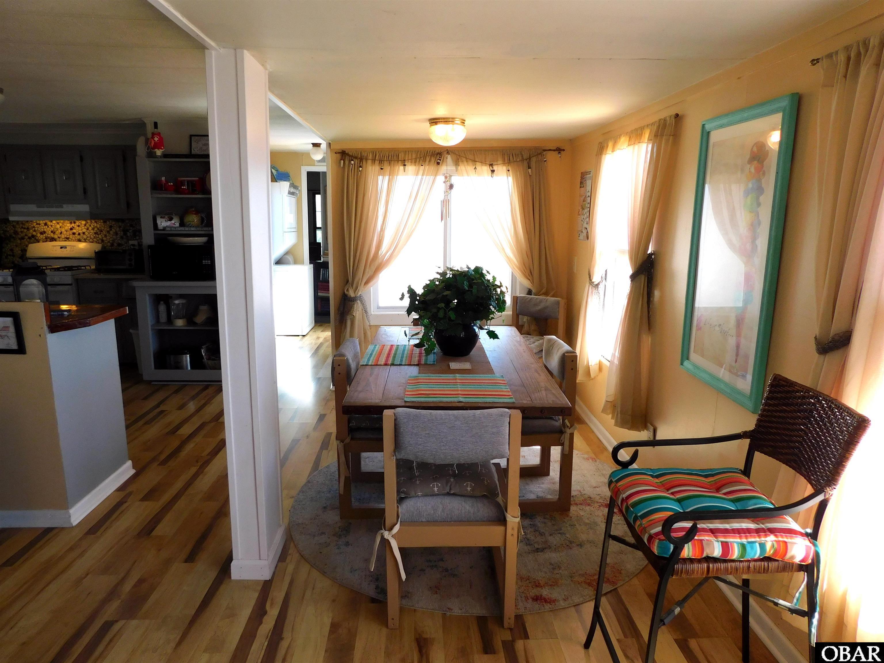 123 Bayview Drive Stumpy Point, NC 27978 - Photo 14 of 46 Dining Area with Sound Views