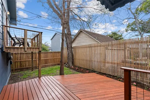 a view of outdoor space with wooden deck