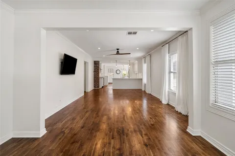 a view of a livingroom with wooden floor