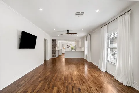 a view of a livingroom with wooden floor