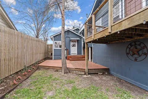 a house with trees in front of it