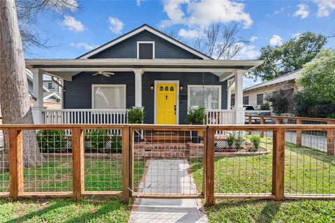 a front view of a house with a porch