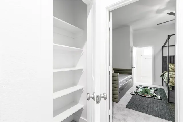 a bathroom with a double vanity sink mirror and