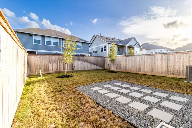 a view of a backyard with a cabin