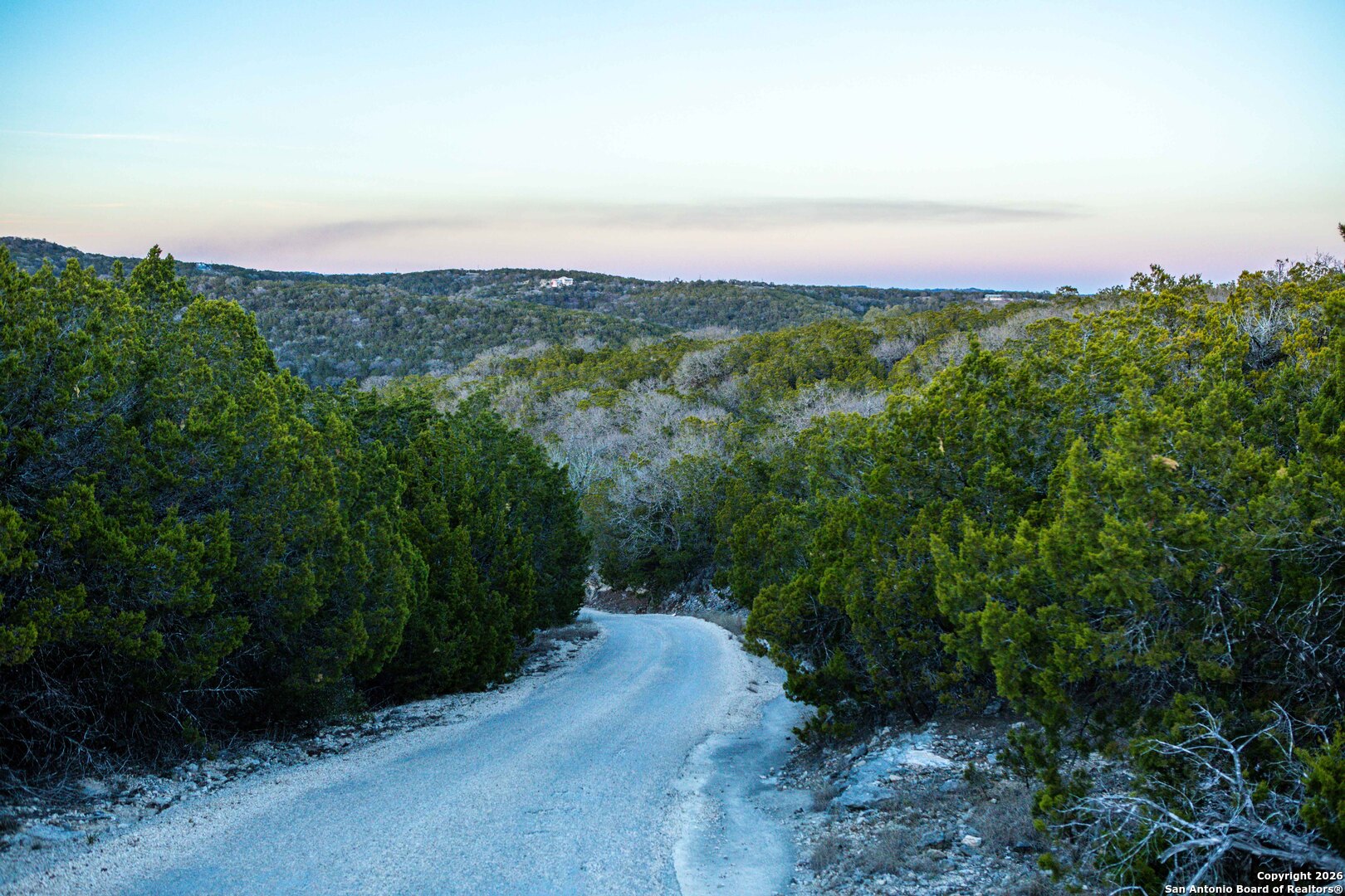 474 Zapata Ridge Medina, TX 78055 - Photo 23 of 35 a view of a city with lush green forest