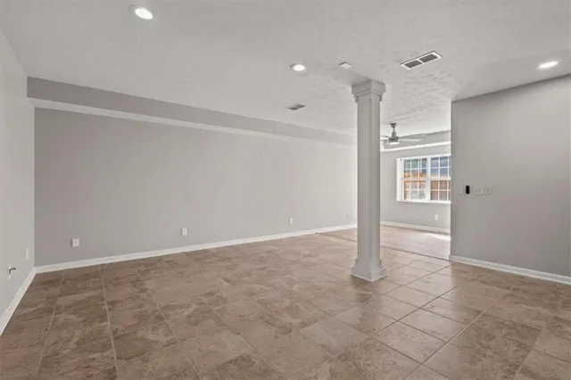 a view of hallway with wooden floor