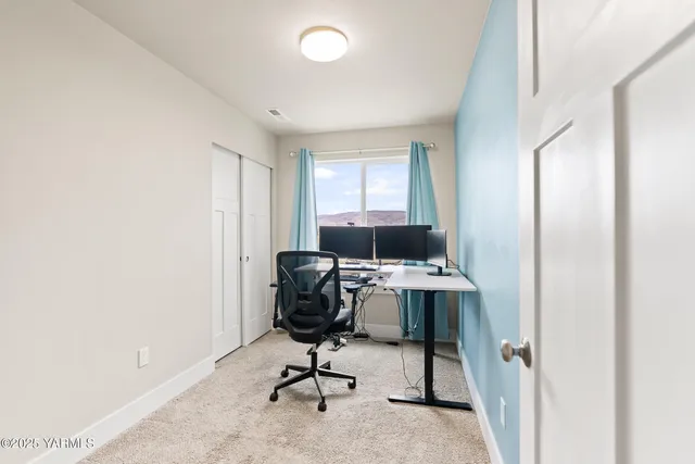 a bathroom with a double vanity sink a mirror and a shower