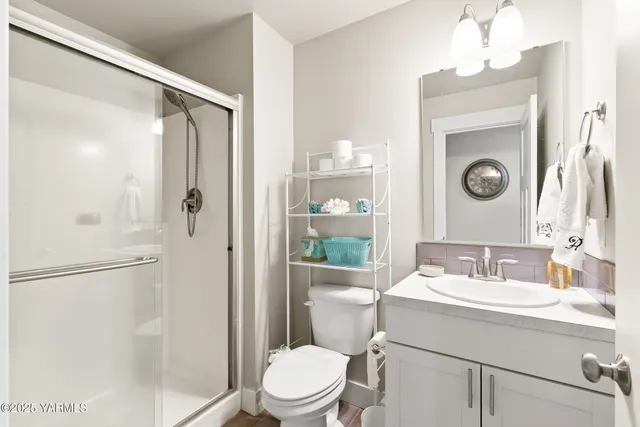 a living room with a couch and a rug