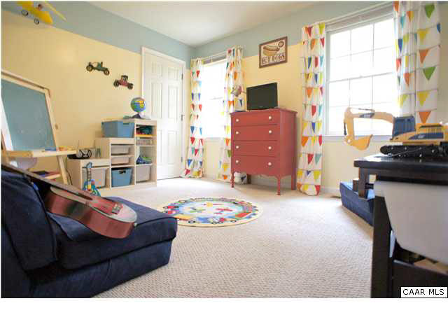 111 Rustling Oaks Way Ruckersville, VA 22968 - Photo 11 of 16 a living room with furniture and a window