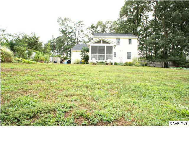 111 Rustling Oaks Way Ruckersville, VA 22968 - Photo 14 of 16 a view of a house with a outdoor space