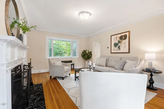 a kitchen with granite countertop a sink stainless steel appliances and cabinets