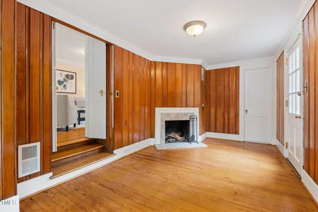 a view of a livingroom with furniture and wooden floor