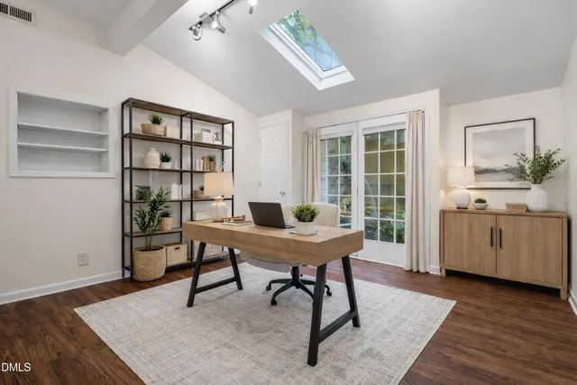 a backyard of a house with lots of green space