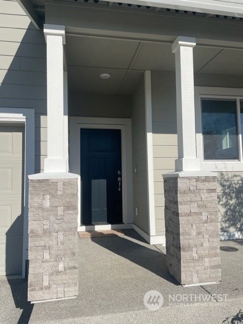 2802 Laurel (lot 4) Loop Milton, WA 98354 - Photo 2 of 18 a front view of a house