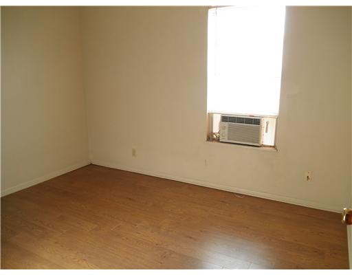 1414 Cook Odem, TX 78370 - Photo 4 of 5 a view of a small space with wooden floor