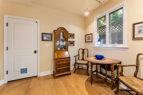 a view of a dining room with furniture window and outside view