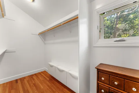 a view of small space with wooden floor
