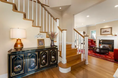 a view of entryway livingroom and hall