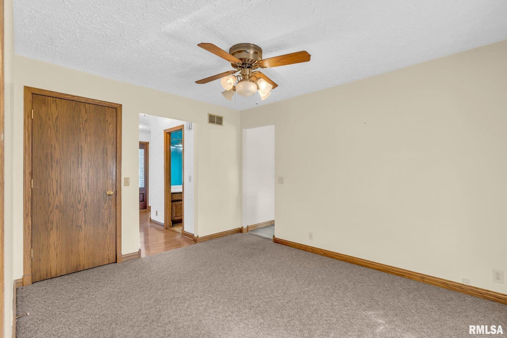 107 Hilltop Street Colona, IL 61241 - Photo 9 of 25 a view of an empty room