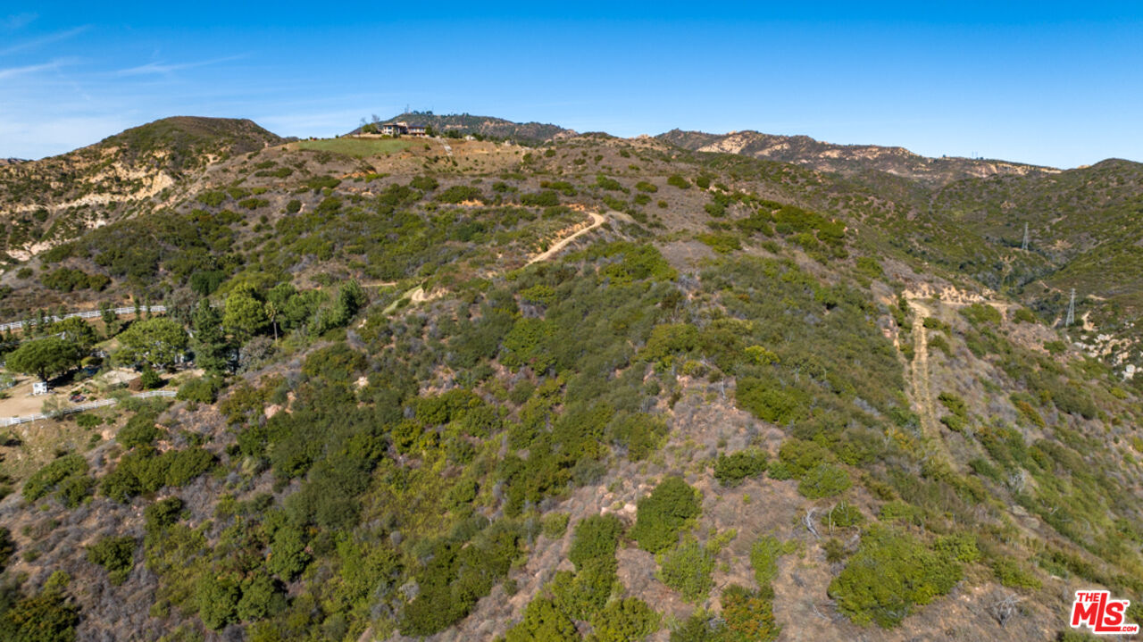 0 Baller Road Malibu, CA 90265 - Photo 10 of 12 a view of a mountain range with a lush green forest
