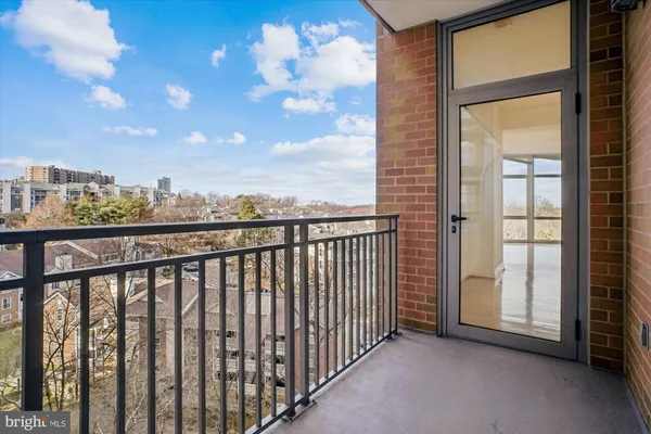 a view of a balcony with city view
