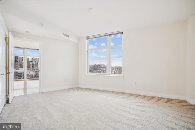 an empty room with a window